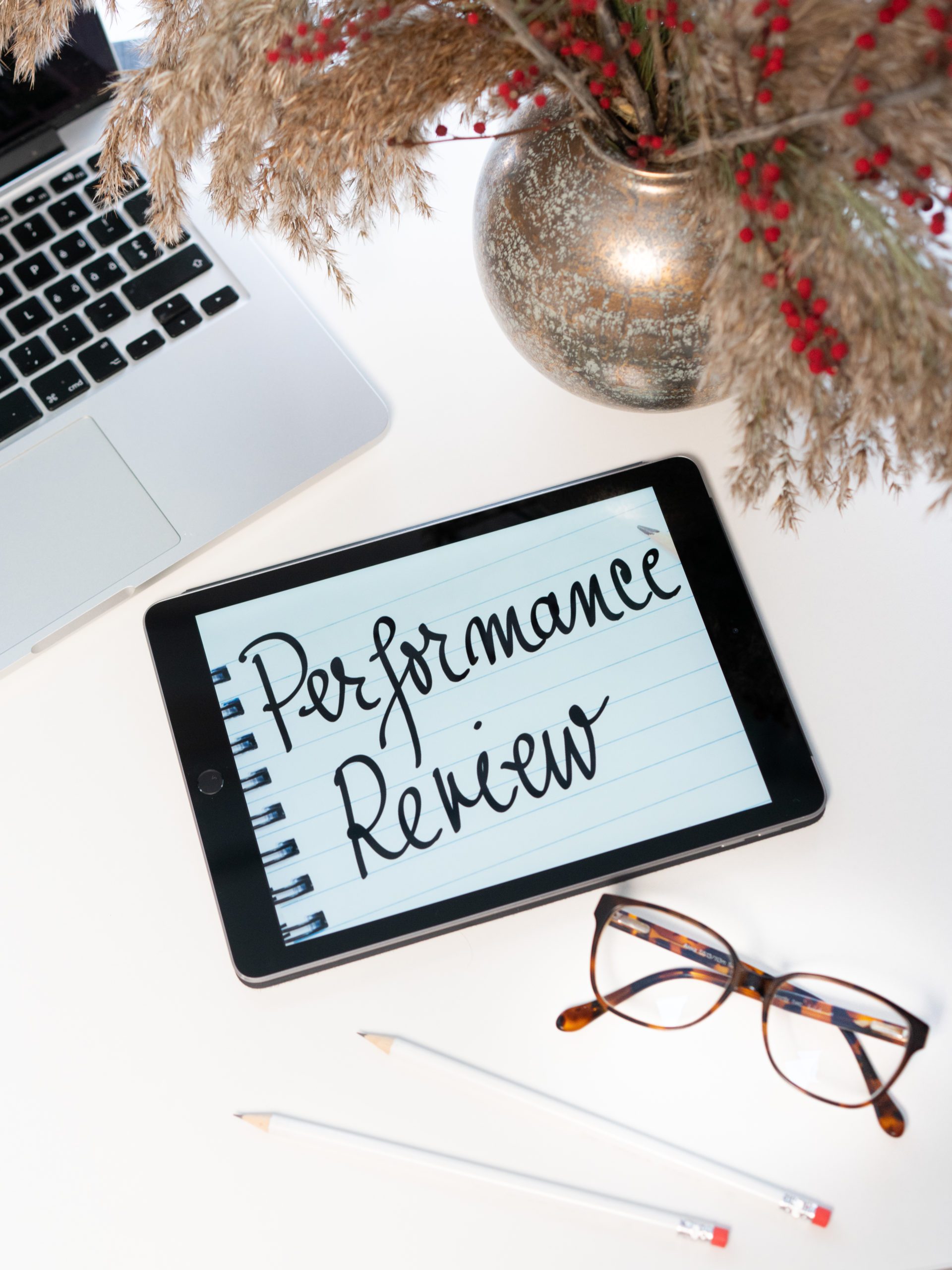 employee performance review office desk avilavi blog